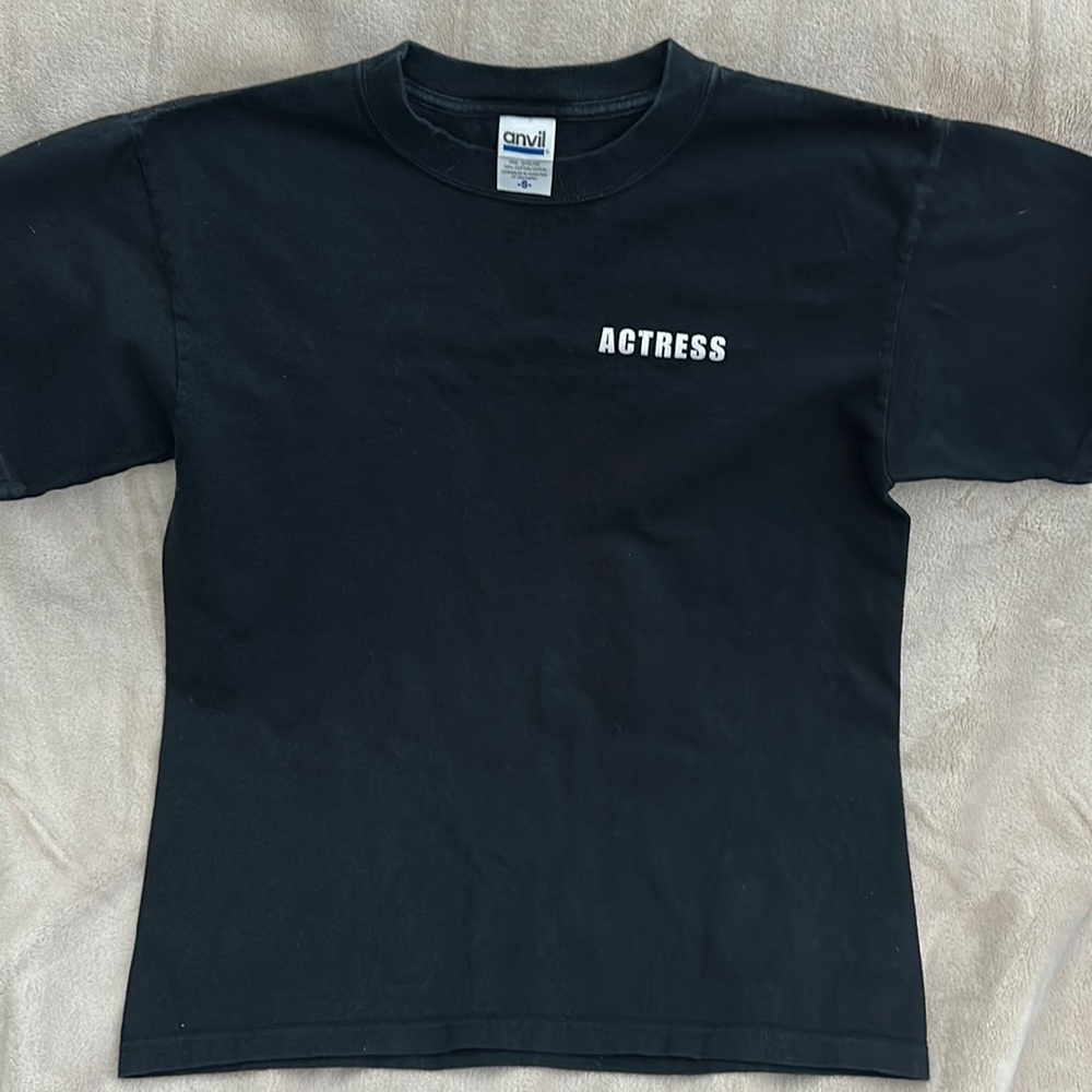 Anvil black tee shirt, size S. Has actress printed on the front and back.